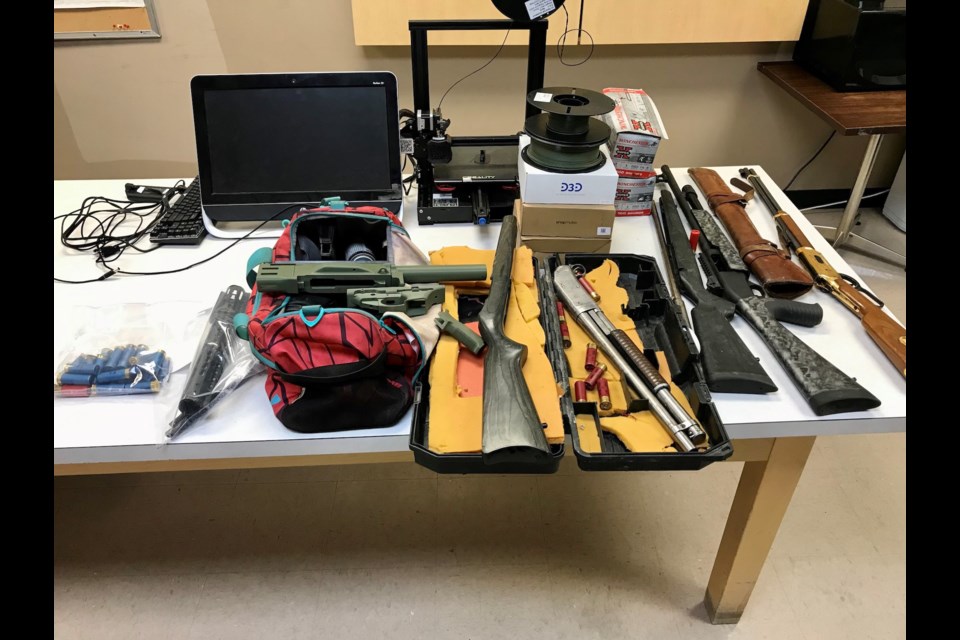 As part of executing a July 10 search warrant, Barrhead RCMP confiscated several weapons, including a loaded shotgun, three long guns and a handgun. They also seized a 3D printer, along with assorted replicated gun parts.