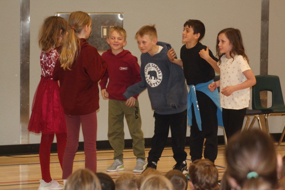 The chicks warn the hens that the sky is falling in this scene from "Chicken Little," which was performed by the Grade 3 students at Busby School during the spring tea on May 2.