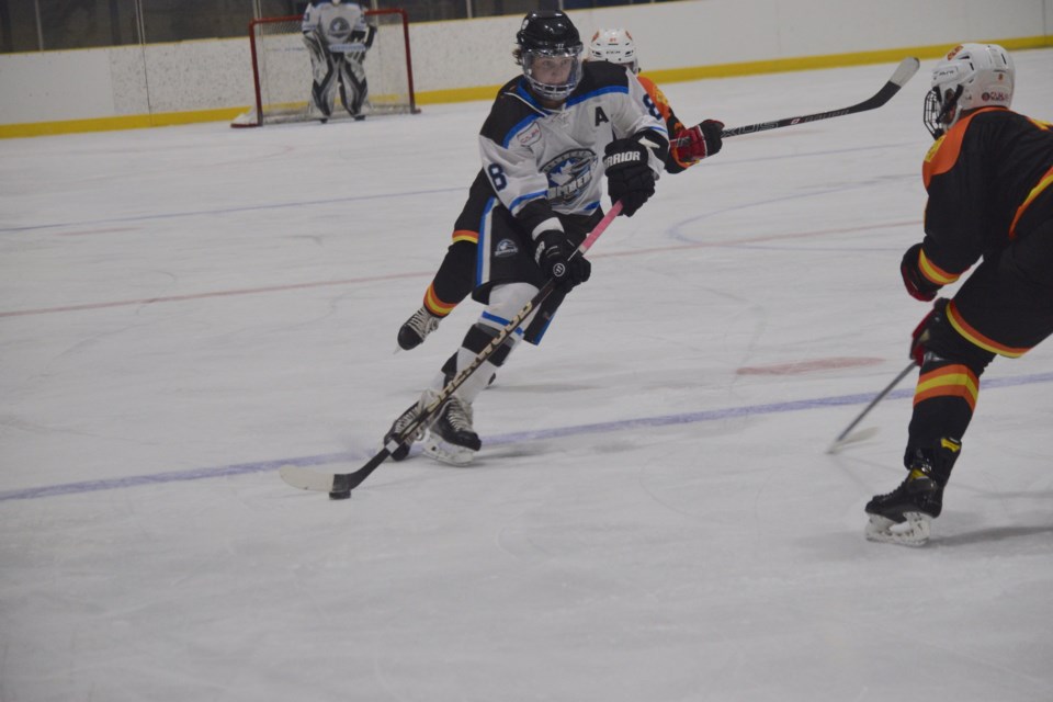 Barrhead assistant captain Cade Bohn skates into the Vegreville zone in the second period.