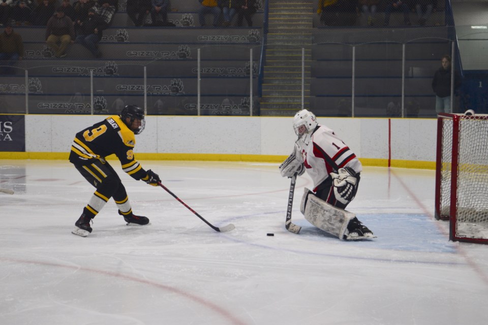 Barrhead's Carter Greilach goes on a breakaway against Mayerthorpe goaltender Jaxson Moon during the March 4 game. Although Greilach did not score on this play, he would end the game with three points, with a goal and two assists.