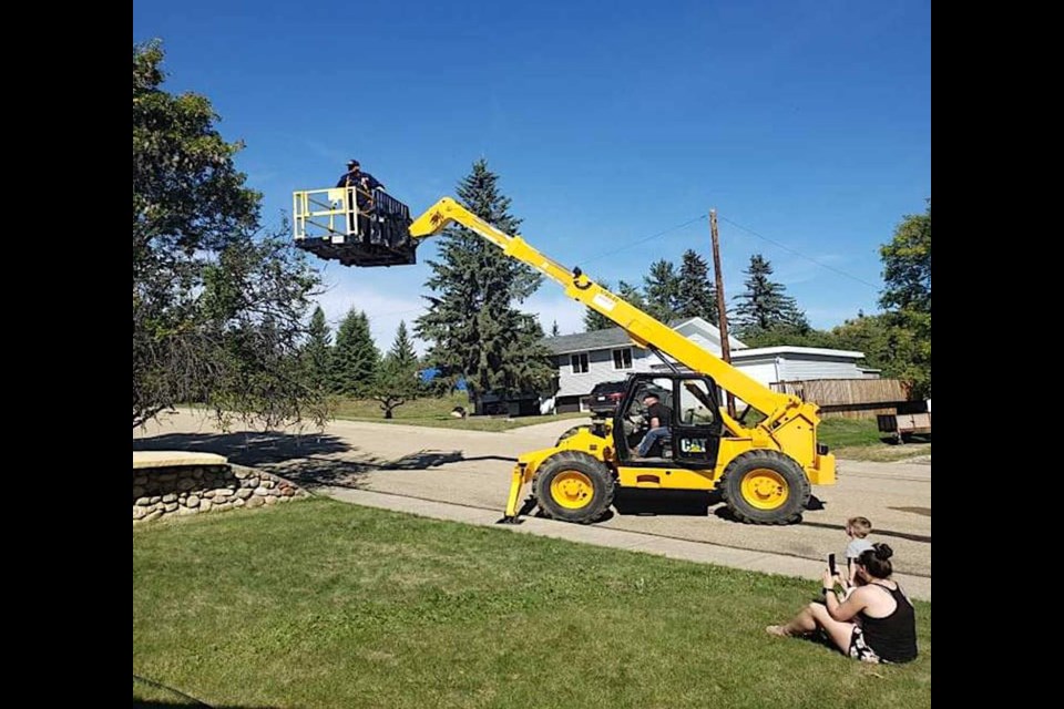It was a scene we’ve all seen played out any number of times, usually on TV, but the heroic rescue of a cat from a tree on 44th Ave. took place in real life in Athabasca Aug. 29.
