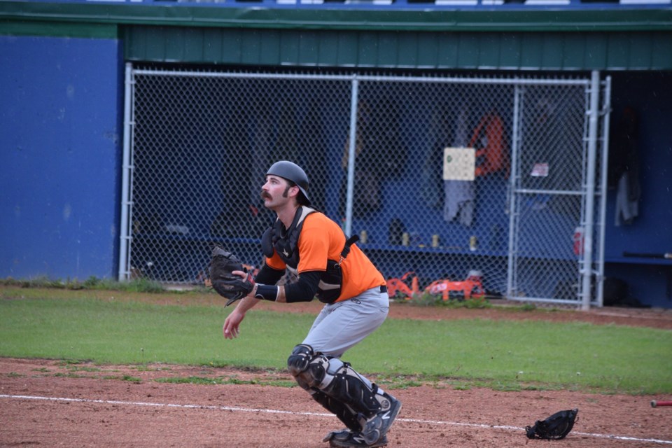 Barrhead catcher Lee Worobec waits for a throw to home in the third inning.