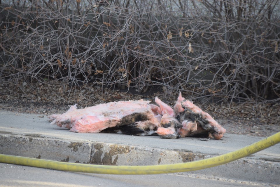 A piece of charred insulation from the St. Anne Parish Catholic Church. BRFS chief Gary Hove said an employee from Barrhead Glass pulled the insulation from around a side window, which basically extinguished the fire before it really did any damage.