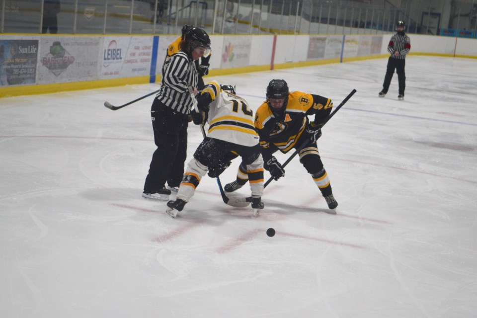 Barrhead's Corbin Wood taking a second-period offensive zone faceoff.