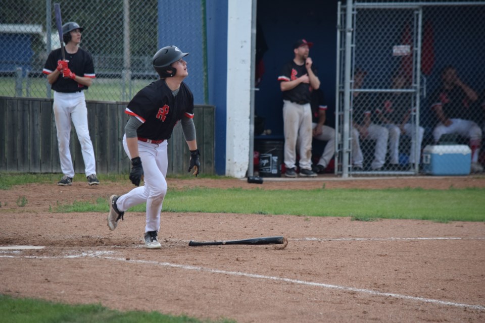 Westlock's Teron Callihoo runs to first base after a hitting a long hit into the outfield which was fielded by a Orioles outfielder for the out.
