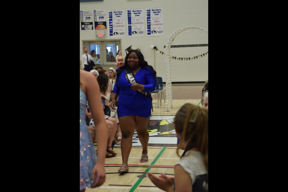NPSC Grade 9 Grad decked out in graduation 2024 sash.