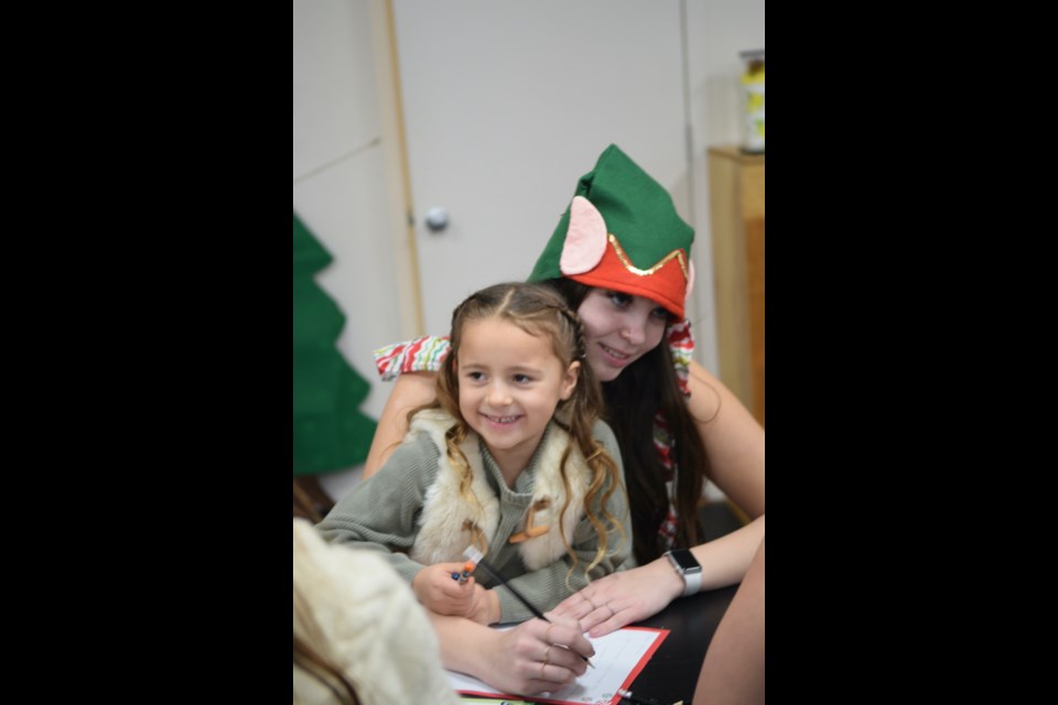 Elf Jacey Harrison with Opal Huff.