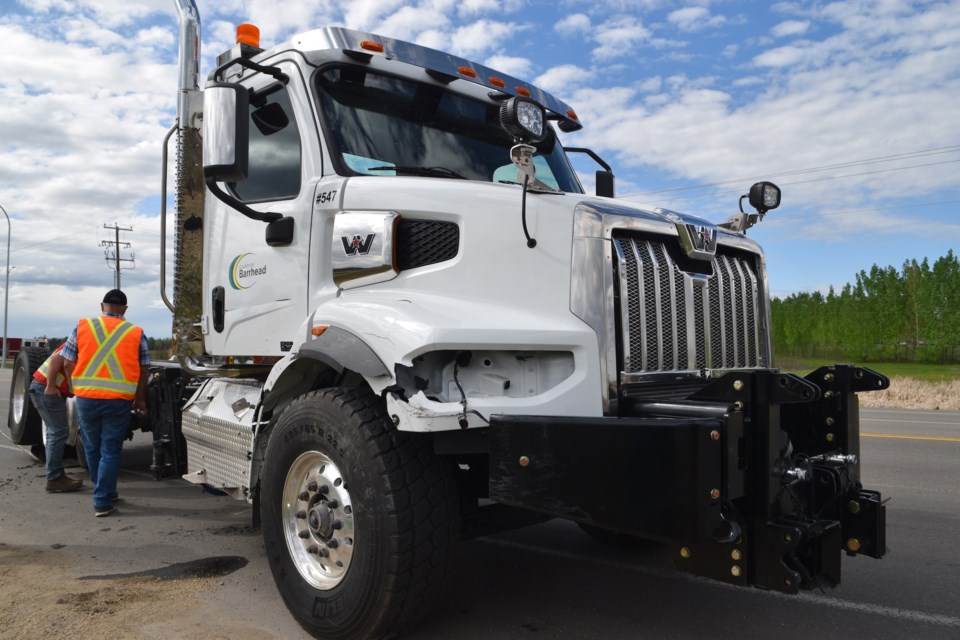 It was a bad day for the County of Barrhead's new gravel/sanding truck as it was involved in an accident the day after the municipality took delivery.
