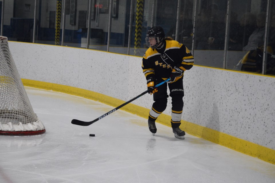 Barrhead defenceman ???? carries the puck out of her end starting from behind her net in the second period of a playoff game against Mayerthorpe on March 4.
