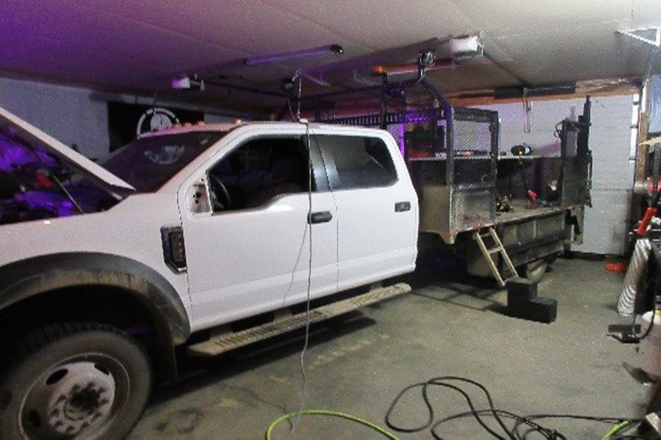 A white extended cab flatbed Ford F-550 was one of several vehicles seized during an Oct. 21 search of a property south of Boyle. More than $250,000 in stolen property was recovered and a Fort McMurray man and Athabasca woman now face multiple charges.
RCMP 