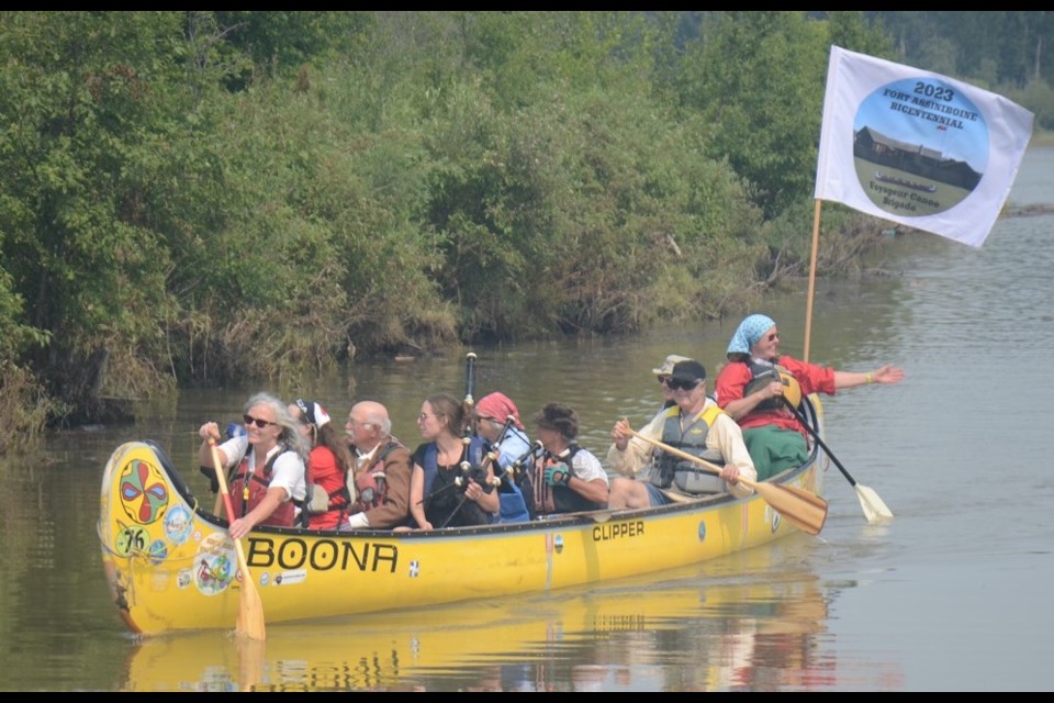 This was the lead canoe in the Athabasca River Brigade, coming to land at the Woodlands RV Park and River Marina July 8. It was carrying Sir George Simpson (Rick Zroback from Hinton) and piper Shalene Stewart from Stony Plain, both of whom can be seen near the middle of the canoe.

LES DUNFORD/T&C