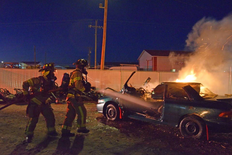 Fire fighters car fire-cropped