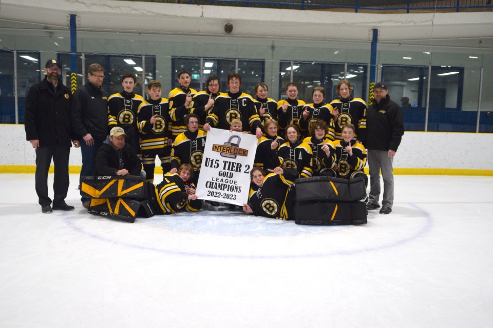 The Barrhead Pirates take time to pose with the NAI U15 Tier 2 Championship banner during their after game celebrations. Backrow L-R: Head coach Alex Luciuk, assistant coach Kassidy Hiemstra, Liam McCauley, James Tyrrell, Ashton Luciuk, Cash Gibert, Kruze Heimstra, Gage Couiyk, Nathan Batty, Brock Beauliua, Conner Kalmbach and assistant coach JC Lane. Middle Row L-R: Assistant coach Chris Gibert, Tanner Harrison, Jack Batty (little boy holding banner), Beckham Bowick, Caden Lane, Layne Young and Rylan Keith. Front row L-R: Goaltenders Dallyn Petiot and Drake Young. Missing: team manager Erin Kalmbach.

