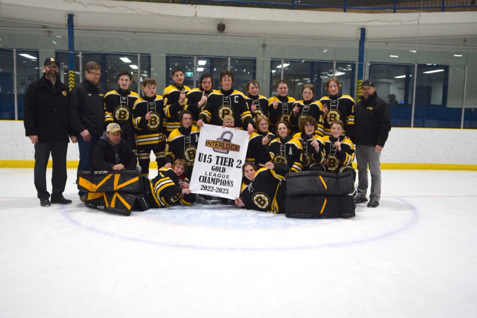 The Barrhead Pirates take time to pose with the NAI U15 Tier 2 Championship banner during their after game celebrations. Backrow L-R: Head coach Alex Luciuk, assistant coach Kassidy Hiemstra, Liam McCauley, James Tyrrell, Ashton Luciuk, Cash Gibert, Kruze Heimstra, Gage Couiyk, Nathan Batty, Brock Beauliua, Conner Kalmbach and assistant coach JC Lane. Middle Row L-R: Assistant coach Chris Gibert, Tanner Harrison, Jack Batty (little boy holding banner), Beckham Bowick, Caden Lane, Layne Young and Rylan Keith. Front row L-R: Goaltenders Dallyn Petiot and Drake Young. Missing: team manager Erin Kalmbach.

