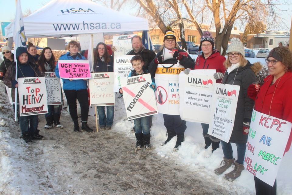 Healthcare workers and teachers were among those demonstrating in Barrhead on Jan. 22 in support of public health care and education. This was not part of a province-wide event, but one of many small demonstrations being held in various locations around the province to protest privatization of both systems.