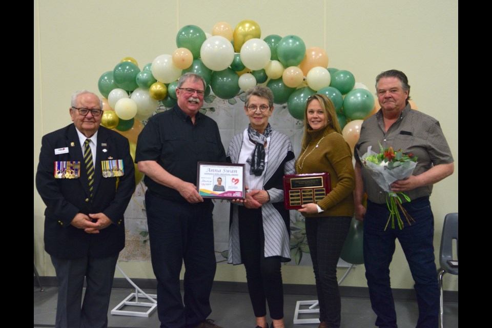 Anna Swan (middle) was presented with the Herman's Heroes Award from past winner Michelle Rau (second from right). Also pictured is Town of Barrhead Dave McKenzie (second from left) and County of Barrhead reeve Doug Drozd (far right) and Herman Barkemeyer (far left), whom the award is named after.