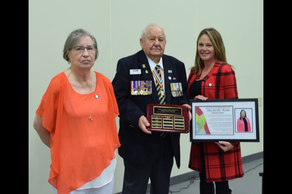 From L-R: Florette Measures, the 2022 award winner, and Herman Barkemeyer, present Michelle Rau with the 2023 Herman's Heroes Award. Barkemeyer is the award's namesake and was its first winner.