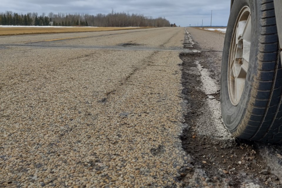 A shot of one of the crevices that follows the white lines on Highway 55, just west of the Al-Pac turnoff. A petition to pressure the government to complete a repaving project that has been promised for years in currently circulating and can be found at numerous businesses throughout Athabasca and surrounding areas. Athabasca County councillors are scheduled to meet Transportation Minister Ric McIver April 8. 