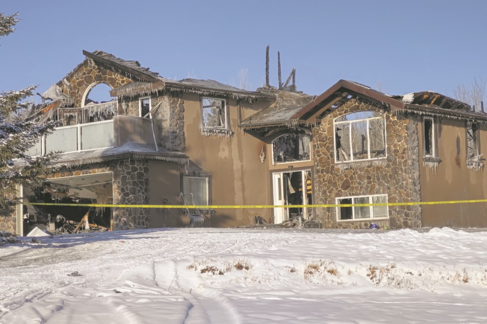 The blaze on Range Road 224, in a subdivision south of Athabasca Jan. 30, was eventually extinguished, but not before gutting the interior of the home. 