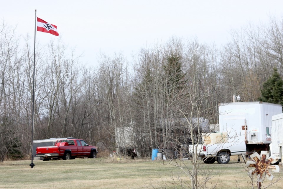 A Hitler Youth flag that was flying over a rural property just south of the Village of Boyle since at least Monday morning was voluntarily removed by the property owner after Boyle RCMP paid him a visit Wednesday evening.