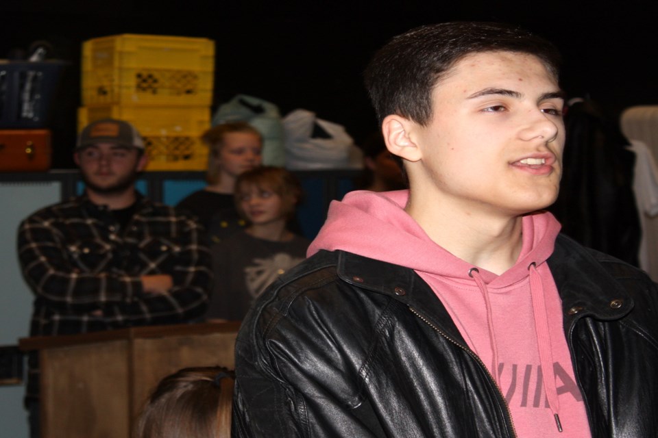 Ryder Slupski (foreground) and Sofie Mestinsek will be taking on two of the lead roles as Ren and Ariel in Edwin Parr Composite School’s production of Footloose at the Nancy Appleby Theatre Dec. 1-3. Pictured, the two sing their hearts out during practice of the opening scene at the school Nov. 16, which takes place in a church where Ariel’s father is the reverend. 