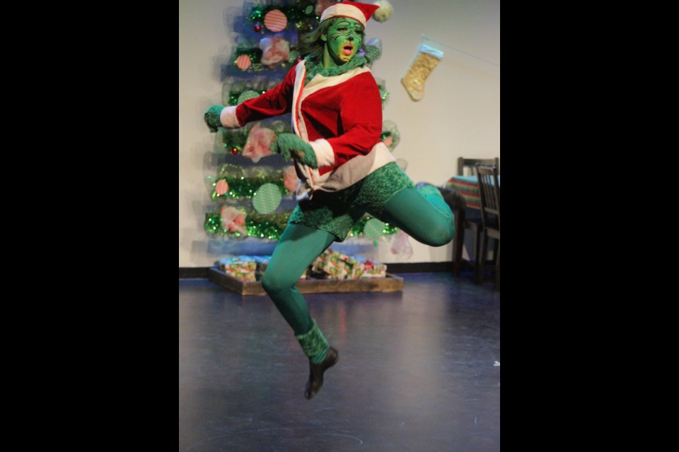 Jacey Harrison leaps with joy after stealing the Christmas of Whoville residents.