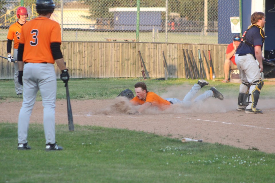 jamie-visser-sliding-into-home-infield-homerun