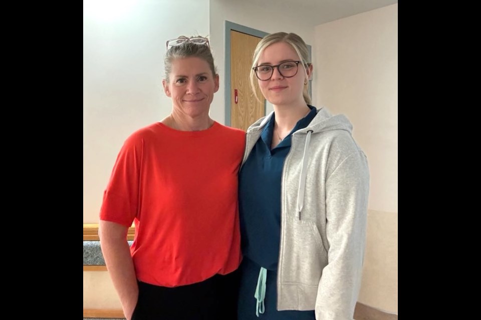 Sarah Burden, right, and mom Jan Baker, left, pose for a photo during a shared shift at the Westlock Hospital June 9. Burden credits her motivation and passion to Baker, who she describes as an "incredible nurse." 