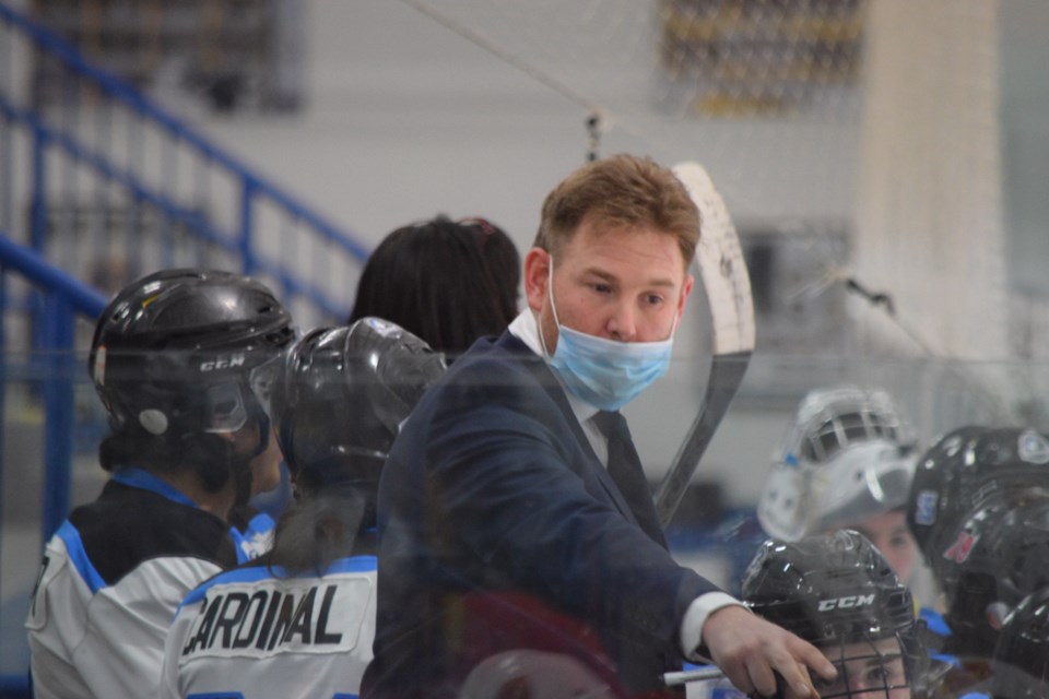 Joey McEwan behind bench Nov.28 copy