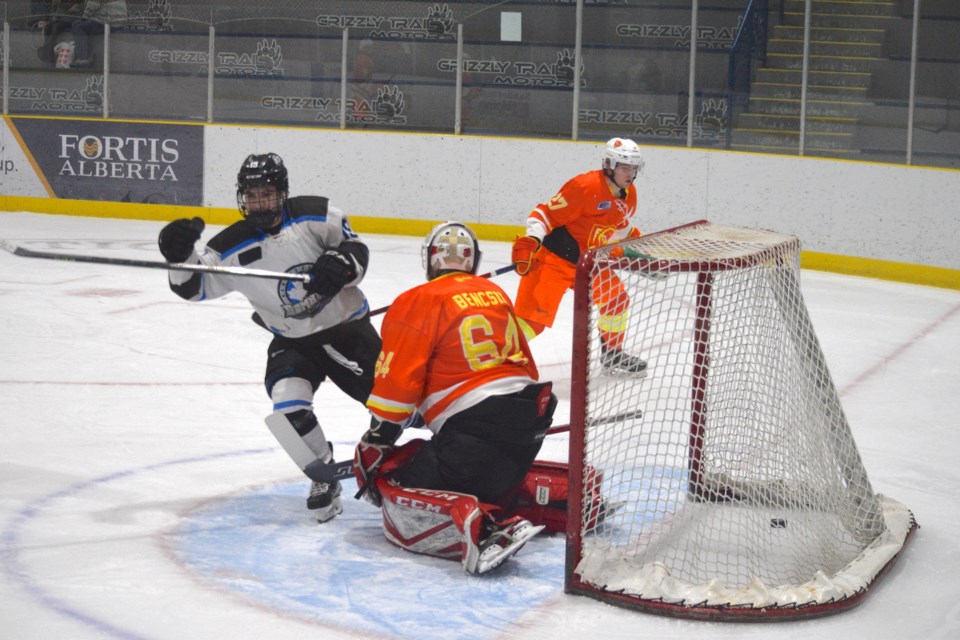 Joshua Kochan celebrates his second goal of the night. Kochan would end the game scoring a hat trick for the Bombers. 