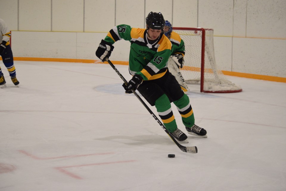 Barrhead rodeo star Kaden Schmidt trades in a saddle for a pair of skates to play with the Cowboys in a March 18 game against the Whitecourt Blades. The Cowboys featured a team of rodeo stars from the Barrhead and Mayerthorpe region.