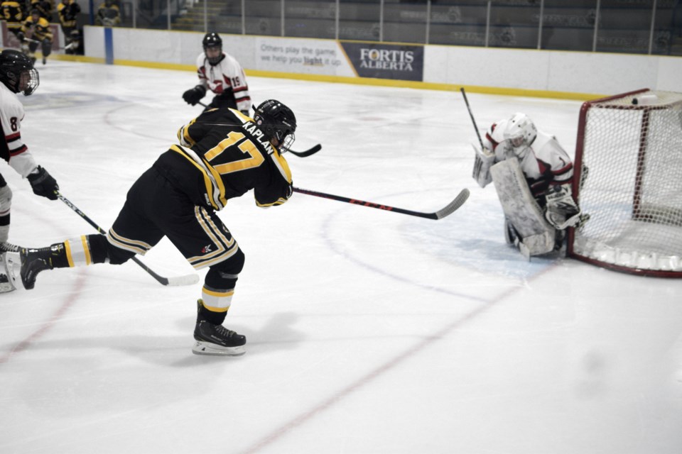 Barread defenceman Magnus Kaplan takes a shot on Mayerthorpe goaltender Jaxson Moon in the second period.