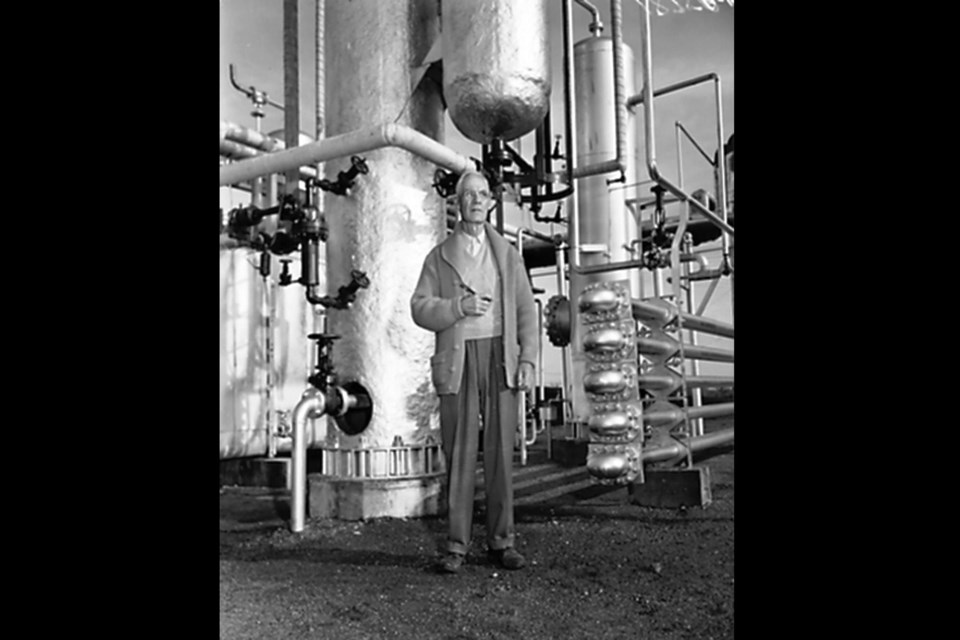 Chemist Karl Clark developed a hot water separation process to separate bitumen from sand.
That process was the precursor to today’s thermal extraction techniques. ABOVE: Clark in his
lab at the University of Alberta, also known as Bitumount, in 1951.