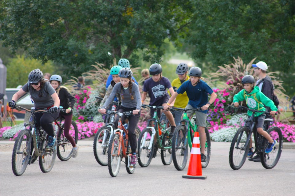 Several different groups took off on their bikes from Riverfront Park at 9 a.m. sharp towards the Muskeg Creek Trails last Saturday, including youth competitors. 

