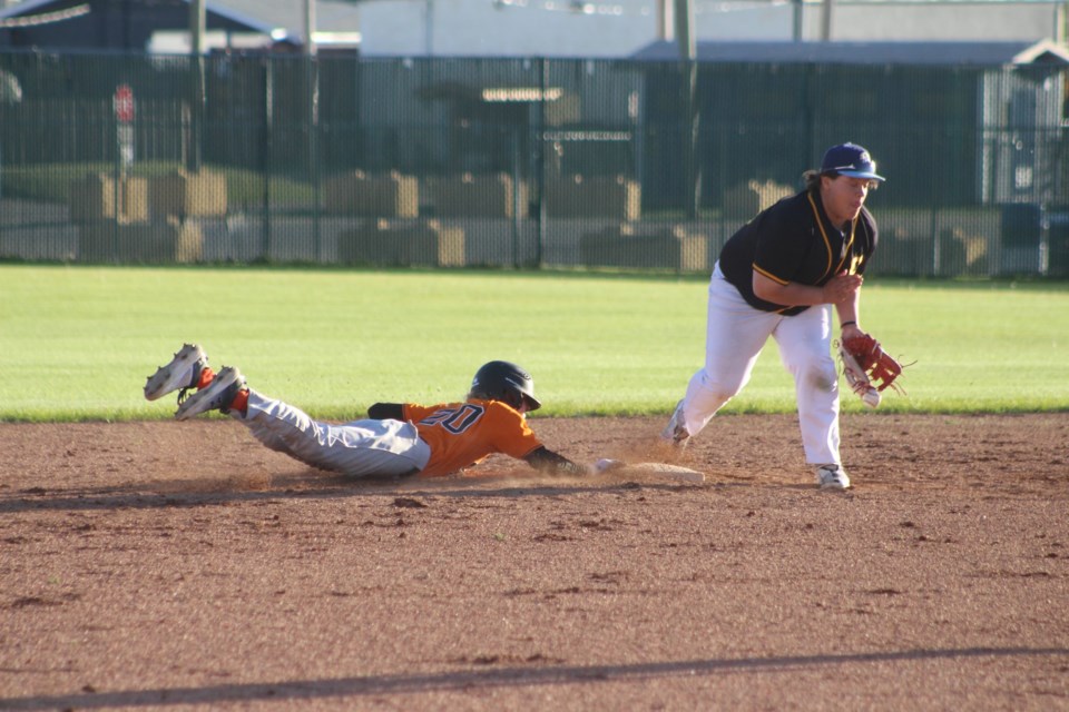 Barrhead outfielder Liam Rentz beating a check at first.