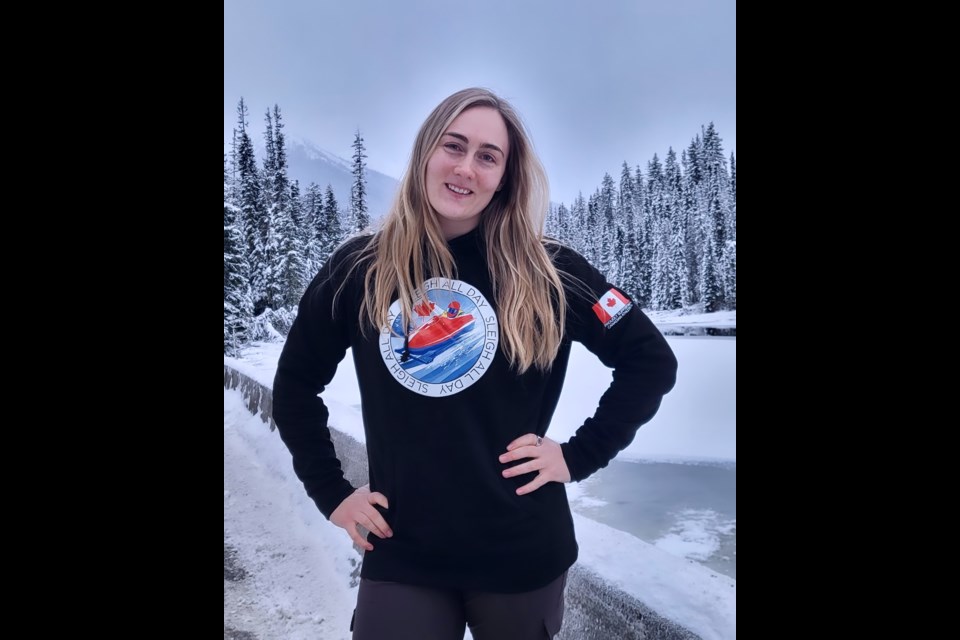 Barrhead Canadian Bobsled team member Melissa Lotholz poses in one of the Eh Team Apparel hoodies. Lotholz launched the business with sled mate Alexandra Klein to help Canadian elite athletes.