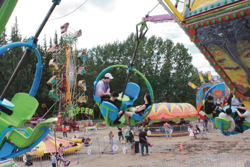 Rides and treats and summer fun in general continued in Athabasca last week as Wild Rose Shows set up for three days July 8-10. Pictured, adrenaline seekers aboard the Tornado, braved the dizzying spins and heights, which was on several high-paced rides on site.