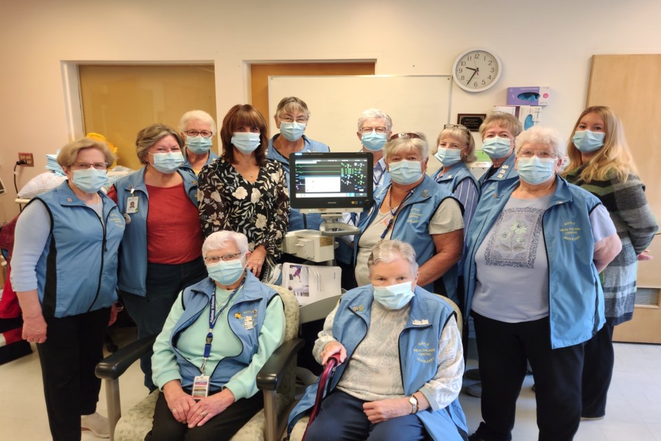 The Boyle Healthcare Auxiliary used a grant from Al-Pac's Community Enhancement Program to bring a new cardiac monitor to the Boyle Healthcare Centre and showed it off a little at the facility Sept. 20. In the back (L-R) is Judy Golanski, Sandy Kuzyk, Val Sinclair, Barb Sullivan with Al-Pac, Belinda Hague, Donna Larson, Judy Flax, Arlene Walker, Judy Dickson, June Rodgers and site manager Christie Schmelzle, with Olga Sworin and Marilyn Wenger in the front. 

