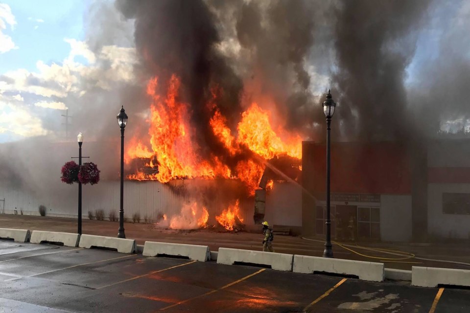 An alarm call to a structure fire at the old Home Hardware building in downtown Athabasca, just before 7 p.m. Aug. 11, had  Athabasca firefighters, along with their mutual aid partners from Boyle, Colinton and Grassland busy well into the night. This photo by eyewitness Kirstyn Veenstra shows the front of the building at 7:08 p.m., just 12 minutes after the first firefighters arrived. The fire completely levelled the building and most firefighters cleared the scene at around 12:30 a.m., but several  Athabasca firefighters remained on-scene into Thursday afternoon to watch for hotspots as the wreckage continued to smoke. 