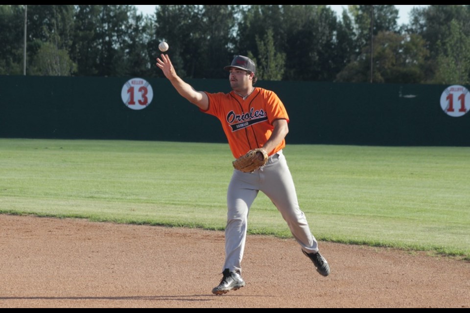 Pacen Jager of the Barrhead Orioles throws the ball to first base to get an out against the St. Albert Cardinals in Game 2 of their playoff series in Westlock Aug. 12. The Orioles fell to St. Albert in two games, losing their first match on Saturday morning 7-4 and then their second game 6-3 in extra innings that evening.