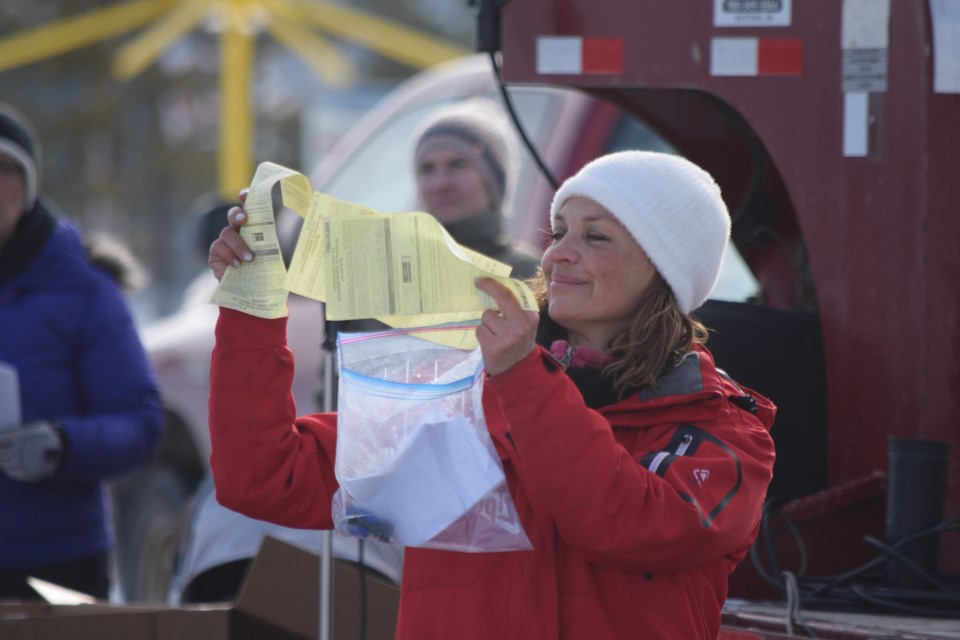 Benita Pedersen displays the tickets she received from RCMP (four) for hosting previous Enough is Enough rallies during the Feb. 27 rally in Barrhead. After the rally she received one more.
Photos by Barry Kerton/BL