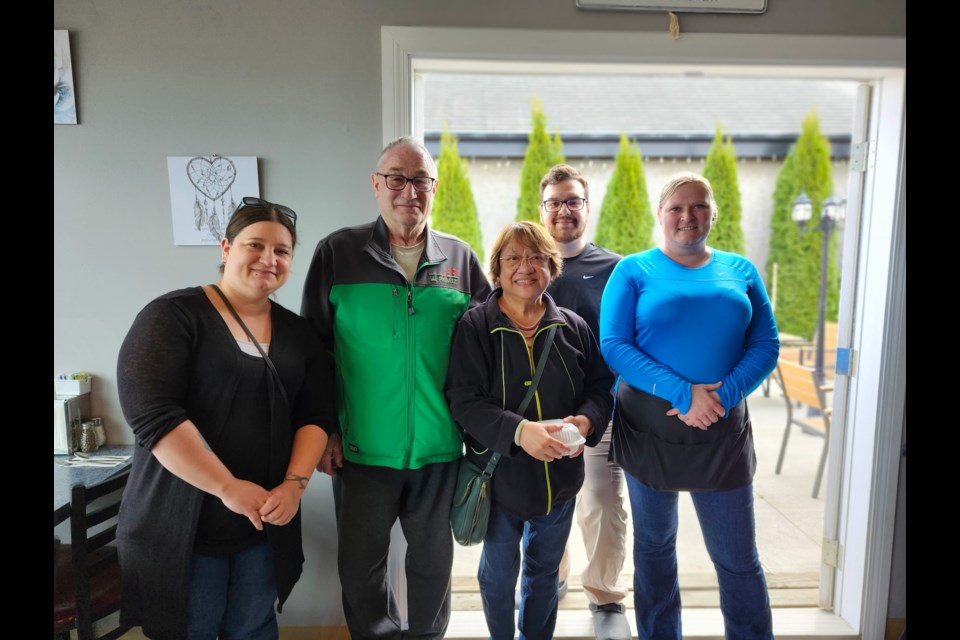 Dan and Liza Gauthier stand alongside Peggy Bistro staff as they made a donation to support free meals for frontline workers following the three-day and three-night response to the wildfire on Highway 831 south that threatened the village and nearby rural properties. Thanks to the efforts of countless volunteers and first responders, no lives or residences were lost. 