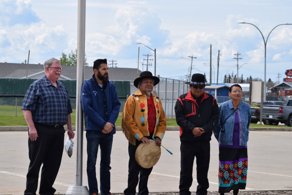 A delegation from the Town of Barrhead and the Alexis Nakota Sioux Nation pose after a May 25 Treaty 6 flag-raising ceremony outside of the Agrena. Pictured from left Town of Barrhead mayor Dave McKenzie, Coun. Ty Assaf, Alexis Nakota Sioux Nation elder Charles Letendre, band leader Willard Alexis and Alexis Nakota Sioux Nation heritage and language department director Liz Letendre.