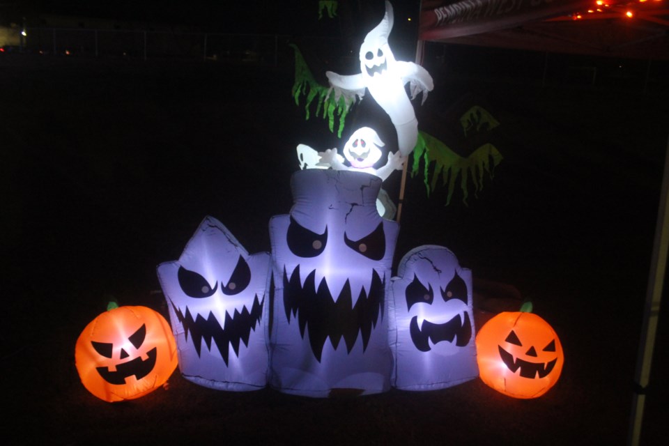 This inflatable display of ghosts and pumpkins was among the decorations set up along the path for the Pumpkin Walk.