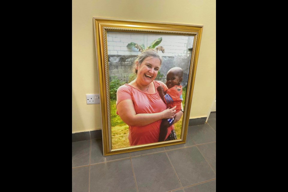 A picture of Raine Kooger on a mission trip to Malawi, Africa.