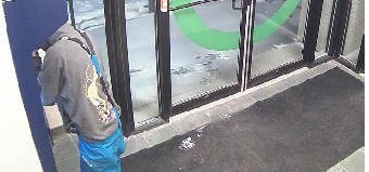 The RCMP are looking for a suspect with a distinctive hoodie who is believed to vandalized an ATM at Servus Credit Union in Barrhead.