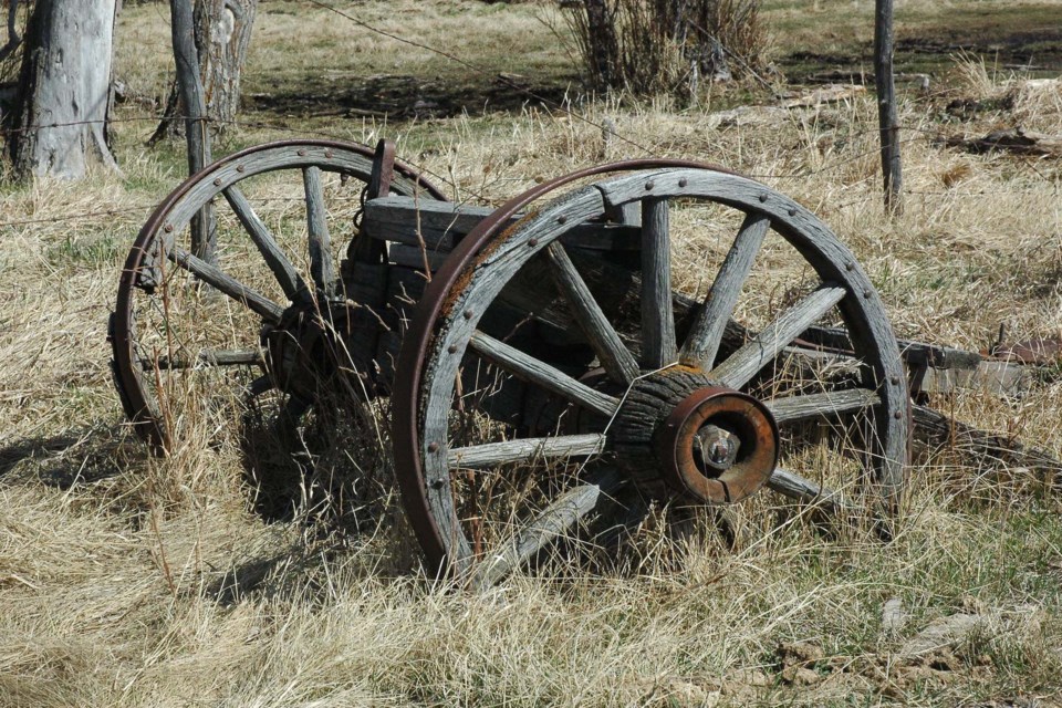 Rear wheels from an old horse-drawn high wheel farm wagon running gear common on farms many years ago Les Dunford