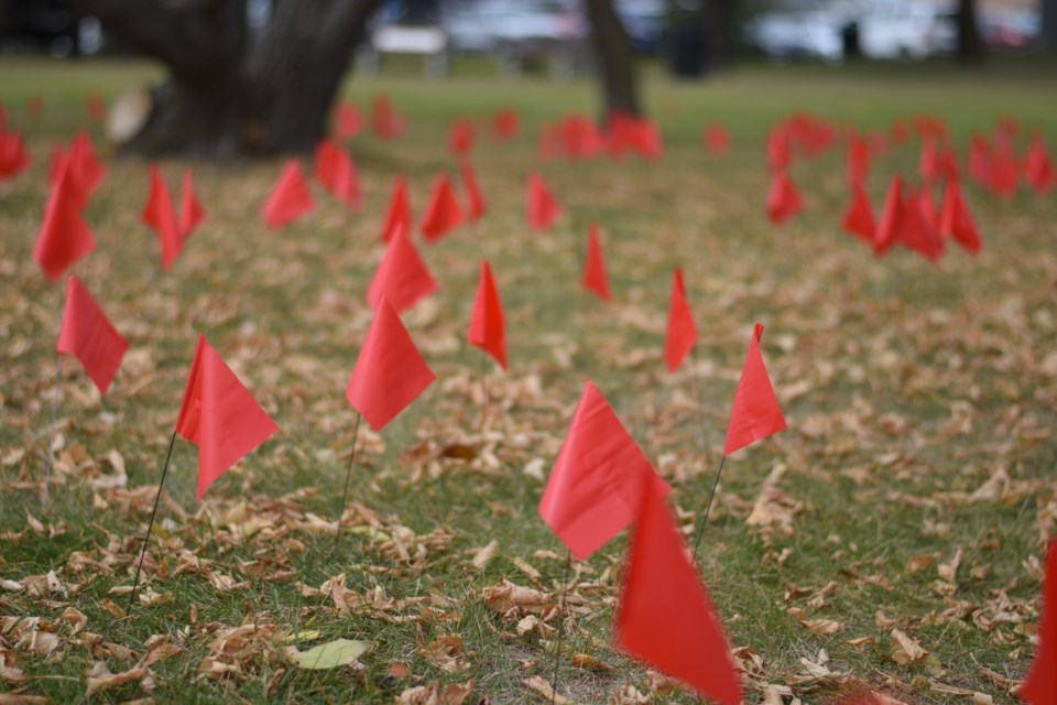 BCHS staff and students placed 751 flags in front of the school to honour those who died while attending Canadian residential schools.
