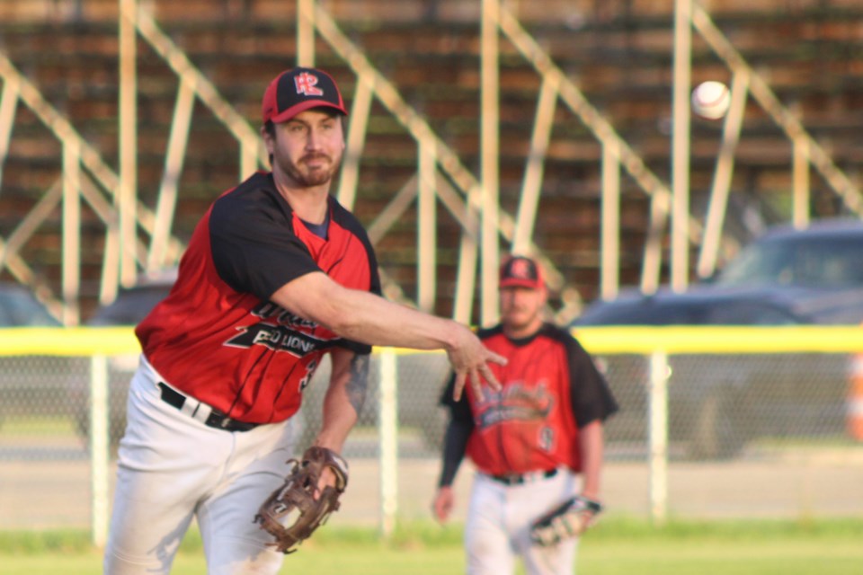 Kris Johnson, who was the second pitcher to take the mound for the Red Lions on July 30, throws to first base in an attempt to tag out the opposing Parkland Twins’ runner. The Red Lions scored a 6-2 victory that night, which was their fourth straight win of this shortened season.
Kevin Berger/T&C