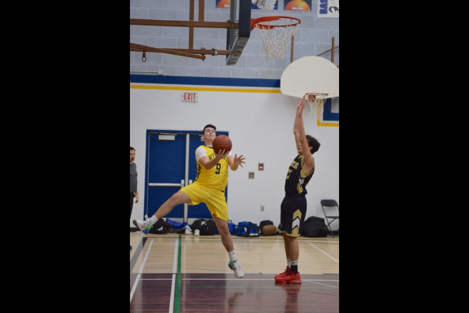 Barrhead's Seth Properzi attempts a one-handed layout in the consolation finals against Devon.